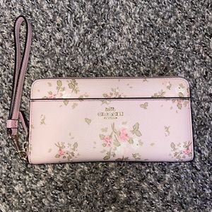 gently used Coach wallet wrislet